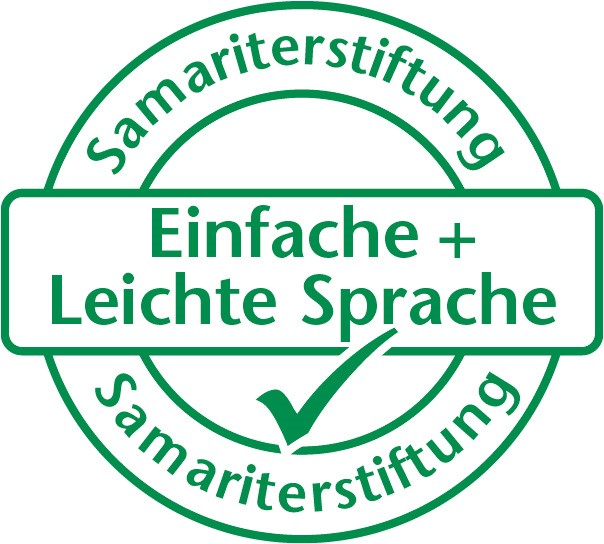 Grünes Logo-Siegel der Samariterstiftung mit dem Text „Einfache + Leichte Sprache“ und Häkchen in der Mitte.